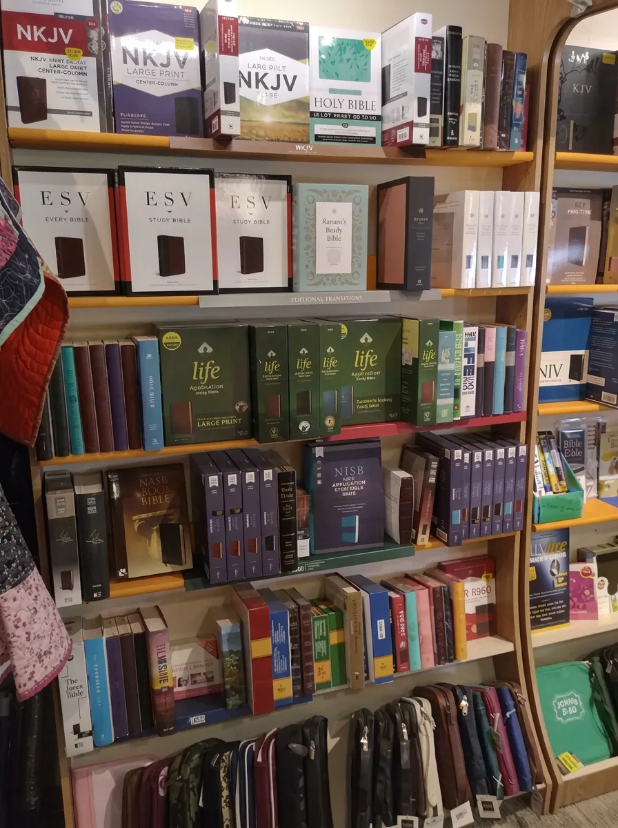 Shelves of Bibles in a variety of translations and bindings