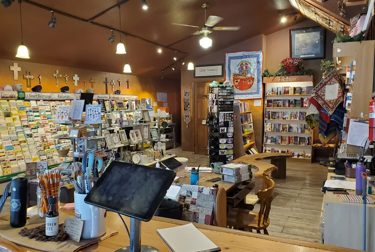 Bookstore interior with checkout counter and fiction section